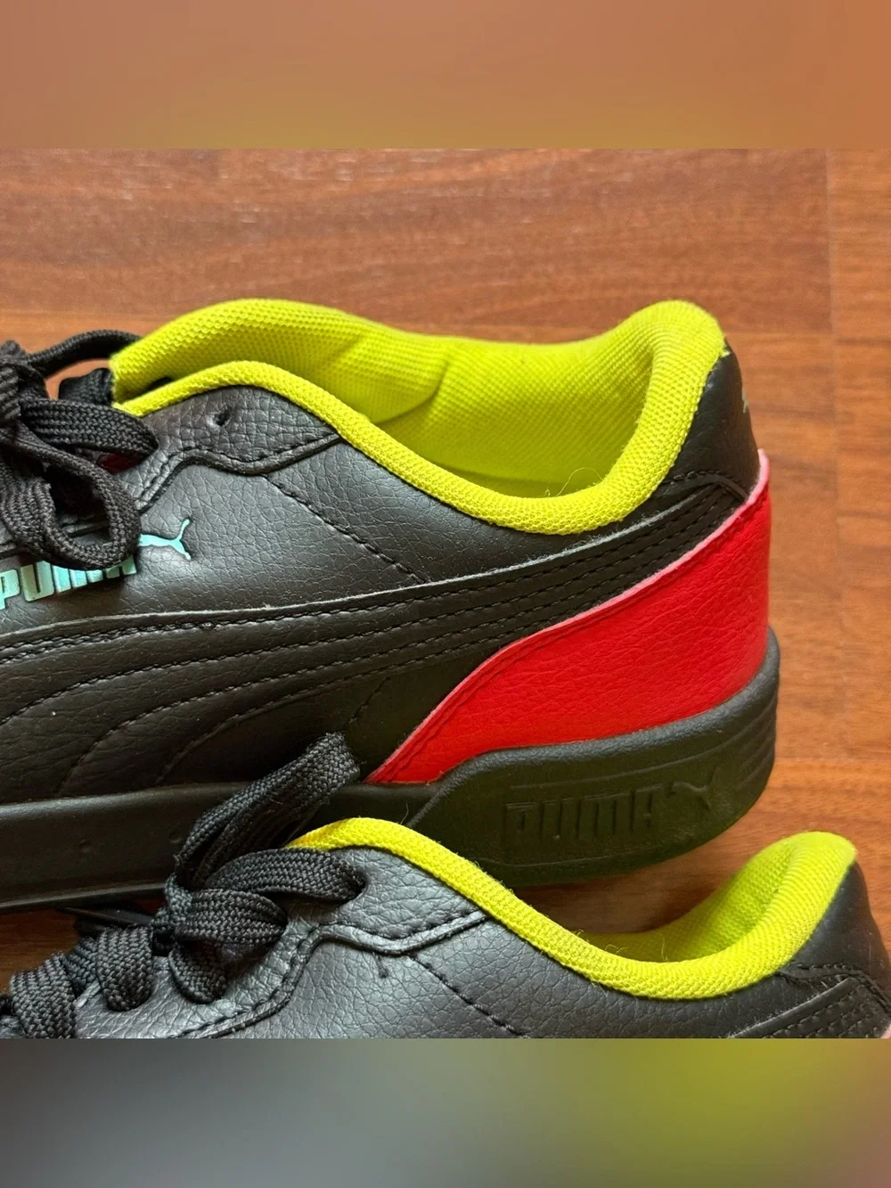 Puma Caracal sneakers men's size 7.5 women's size 9 black high-risk red nrgy